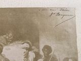 an old photo of a woman holding a baby