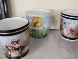 three cups that are sitting on a table