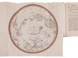 an open book with a map of the world on it