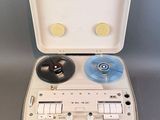 a white box with a record player inside of it