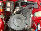 an image of a car engine with a blower