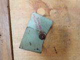 a small piece of paper that is on a wooden table
