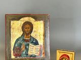 une image représentant un tableau où l'on voit Jésus tenant un livre à côté d'une petite boîte en bois