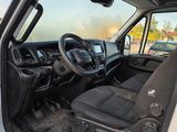 a picture of the inside of a truck with the driver ' s seat down