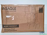 the box of the chair is sitting on the table next to the box