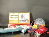 a small toy airplane and other items on a table