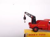a toy truck that is sitting on top of a box