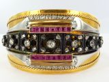 bracelets rigides bicolores or et argent, ornés de pierres roses et noires