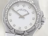 an image of a close up of a wrist watch with diamonds on it
