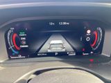 the dashboard of a car with a digital display on it