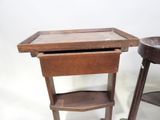 a small wooden table with a drawer underneath it
