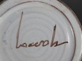 a close up of a plate with the word love written on it