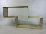 a small wooden shelf with a shelf on it