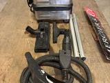 an image of a blow dryer and other items on a table