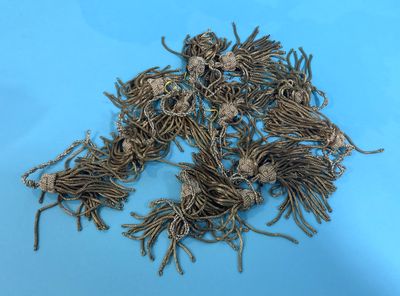 a pile of rope that is on a blue surface