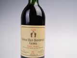 a bottle of wine that is sitting on a table