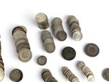 a lot of coins that are next to each other