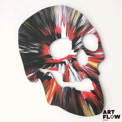 a picture of a mask with a skull on it
