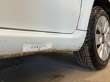 a close up of a car tire with a sticker on it