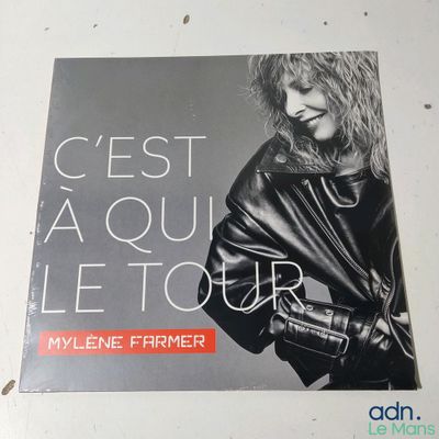 the cover of a book with a black and white photo of a woman in a leather jacket