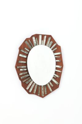 a mirror that is on the wall in the room