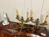 a wooden table with a bunch of candles on top of it