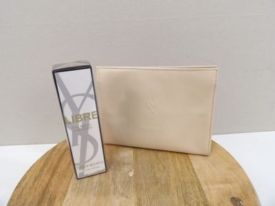 beige leather wallet with a card case on top of a wooden table