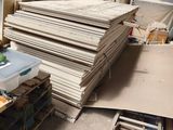 a pile of cardboard sitting on a pallet in a warehouse