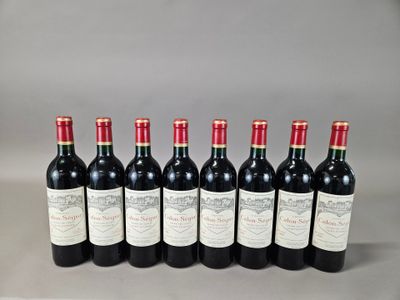 six bottles of red wine lined up in a row