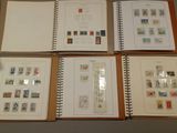 several different types of stamps are displayed in a book