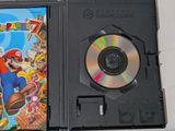 a nintendo game in a case with a cd inside of it
