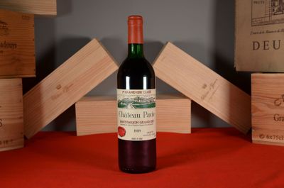 a bottle of wine that is sitting on a table