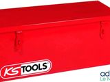une boîte à outils rouge sur laquelle est inscrit « outils »