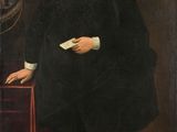 portrait of a man in a black coat and white collar holding a book