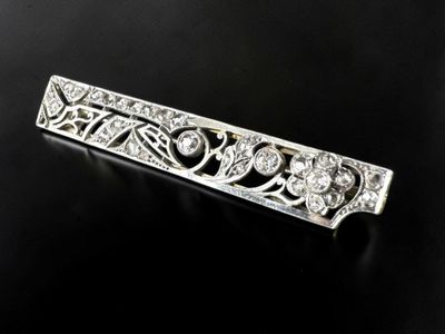 an antique diamond bar broochle