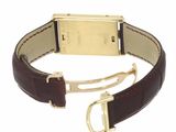 an image of a wrist watch with a gold plated buckle