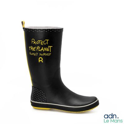 a close up of a pair of rain boots with the words protect the planet
