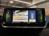 a picture of a car ' s dashboard with three cameras on it