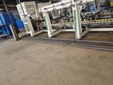 a machine that is working on a piece of metal