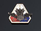 the emblem of a motorcycle is shown on a black surface