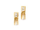une paire de boucles d'oreilles en or jaune serties de diamants sur fond blanc