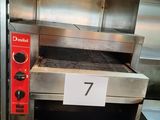 une photo d'un four à pizza professionnel sur lequel figure le chiffre 7