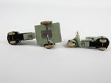 pair of green and black toy cars on a white surface