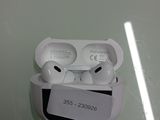 two airpods that are sitting in a box on the wall