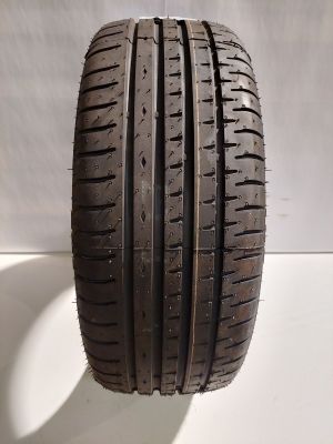 a close up of a tire on a white surface