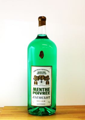 a bottle of alcohol that is sitting on a table