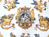 a plate with a picture of a lion, a lion, a lion, a lion, a lion, a lion, a lion, and a lion