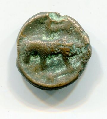an old coin with a small hole in the middle of it