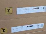 two boxes with different labels on them sitting on a table