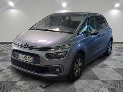 the citrole is parked on a checkered floor in a garage